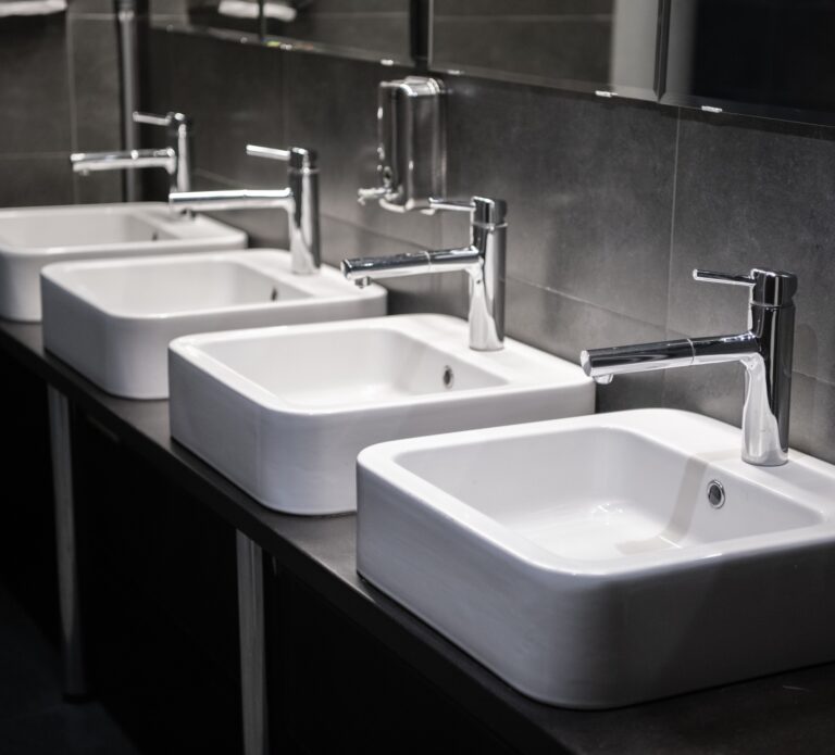 Modern sinks with mirror in public toilet